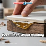 Transbond Marine Multisubstrate Epoxy Adhesive kit, 1kg Resin Part A and 800g Hardener Part B containers. Transbond Marine Multisubstrate Epoxy Adhesive suitable for bonding wood, metal, stone, concrete, and ceramic. Transbond Marine Epoxy Adhesive specs: 60 min setting time, 100:80 mixing ratio, gel viscosity, high bond strength. Transbond Marine Epoxy Adhesive: 30 min pot-life, 100:80 mix ratio, 300 min cure. Pack sizes: 450g, 1.8kg, 9kg. Transbond Marine Epoxy Adhesive demonstrating high-strength metal to stone bonding with thick amber gel. Transbond Marine Epoxy Adhesive used for metal to wood bonding, clamped tightly with amber gel visible. Applying Transbond Marine Epoxy Adhesive with a putty knife for strong wood to wood bonding. Transbond Marine Epoxy Adhesive bonding a ceramic tile to a wood block, showing thick amber gel. Transbond Marine Epoxy Adhesive applied with a putty knife for concrete to stone bonding.