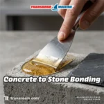 Transbond Marine Multisubstrate Epoxy Adhesive kit, 1kg Resin Part A and 800g Hardener Part B containers. Transbond Marine Multisubstrate Epoxy Adhesive suitable for bonding wood, metal, stone, concrete, and ceramic. Transbond Marine Epoxy Adhesive specs: 60 min setting time, 100:80 mixing ratio, gel viscosity, high bond strength. Transbond Marine Epoxy Adhesive: 30 min pot-life, 100:80 mix ratio, 300 min cure. Pack sizes: 450g, 1.8kg, 9kg. Transbond Marine Epoxy Adhesive demonstrating high-strength metal to stone bonding with thick amber gel. Transbond Marine Epoxy Adhesive used for metal to wood bonding, clamped tightly with amber gel visible. Applying Transbond Marine Epoxy Adhesive with a putty knife for strong wood to wood bonding. Transbond Marine Epoxy Adhesive bonding a ceramic tile to a wood block, showing thick amber gel. Transbond Marine Epoxy Adhesive applied with a putty knife for concrete to stone bonding.